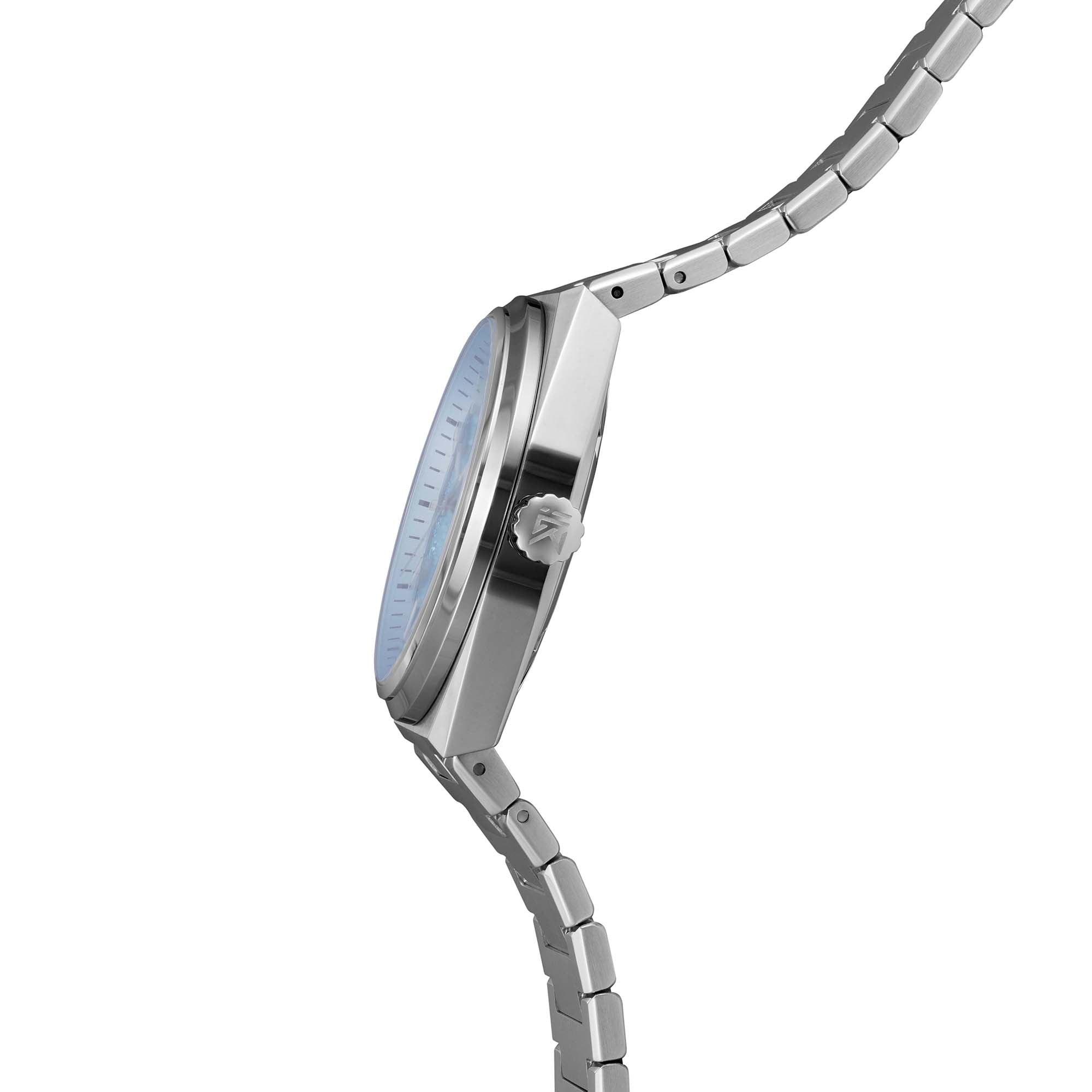 Side view of Arcana watch with polished crown and brushed stainless steel case profile.