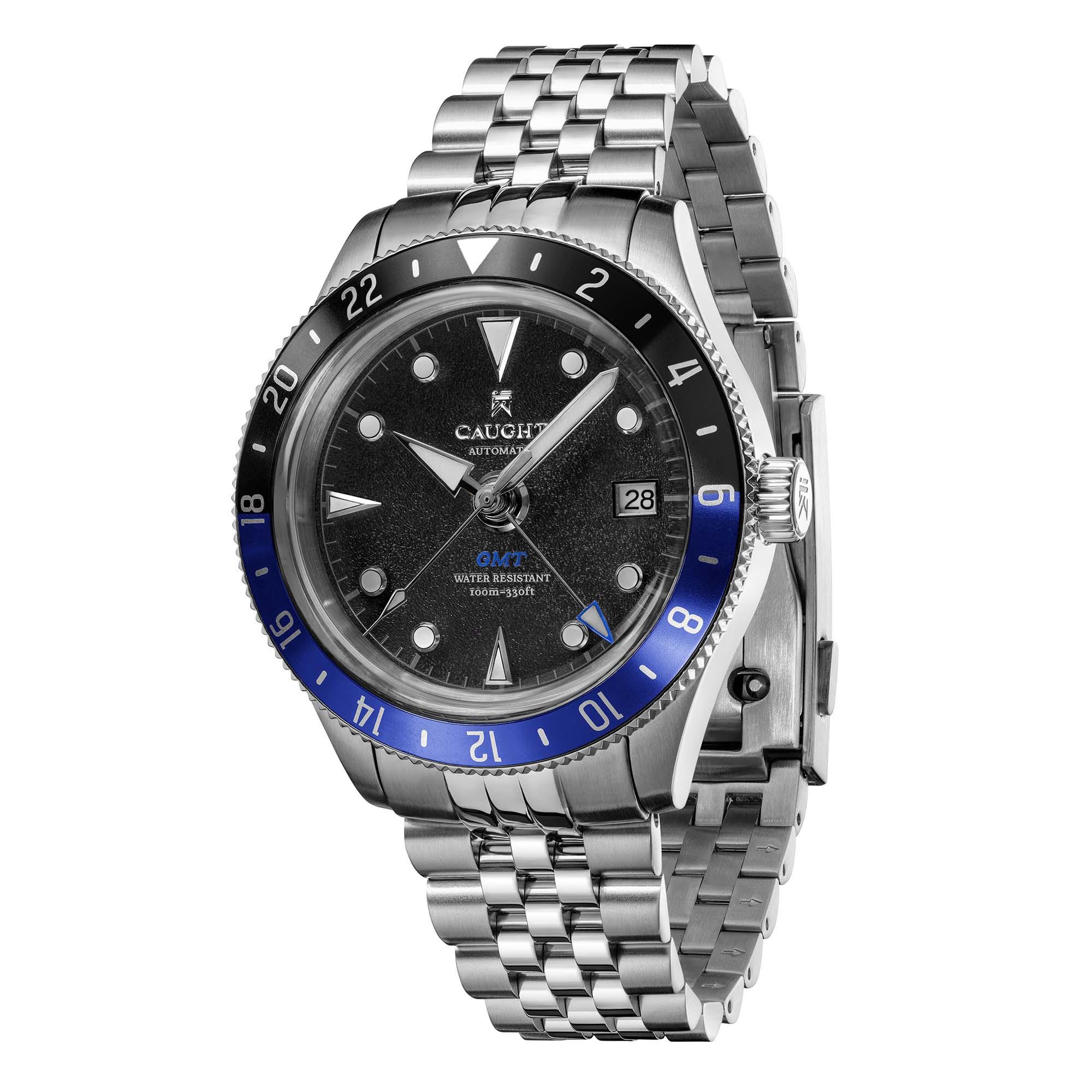 Nomad-Black/Blue GMT men's watch with silver steel bracelet, luxury design.