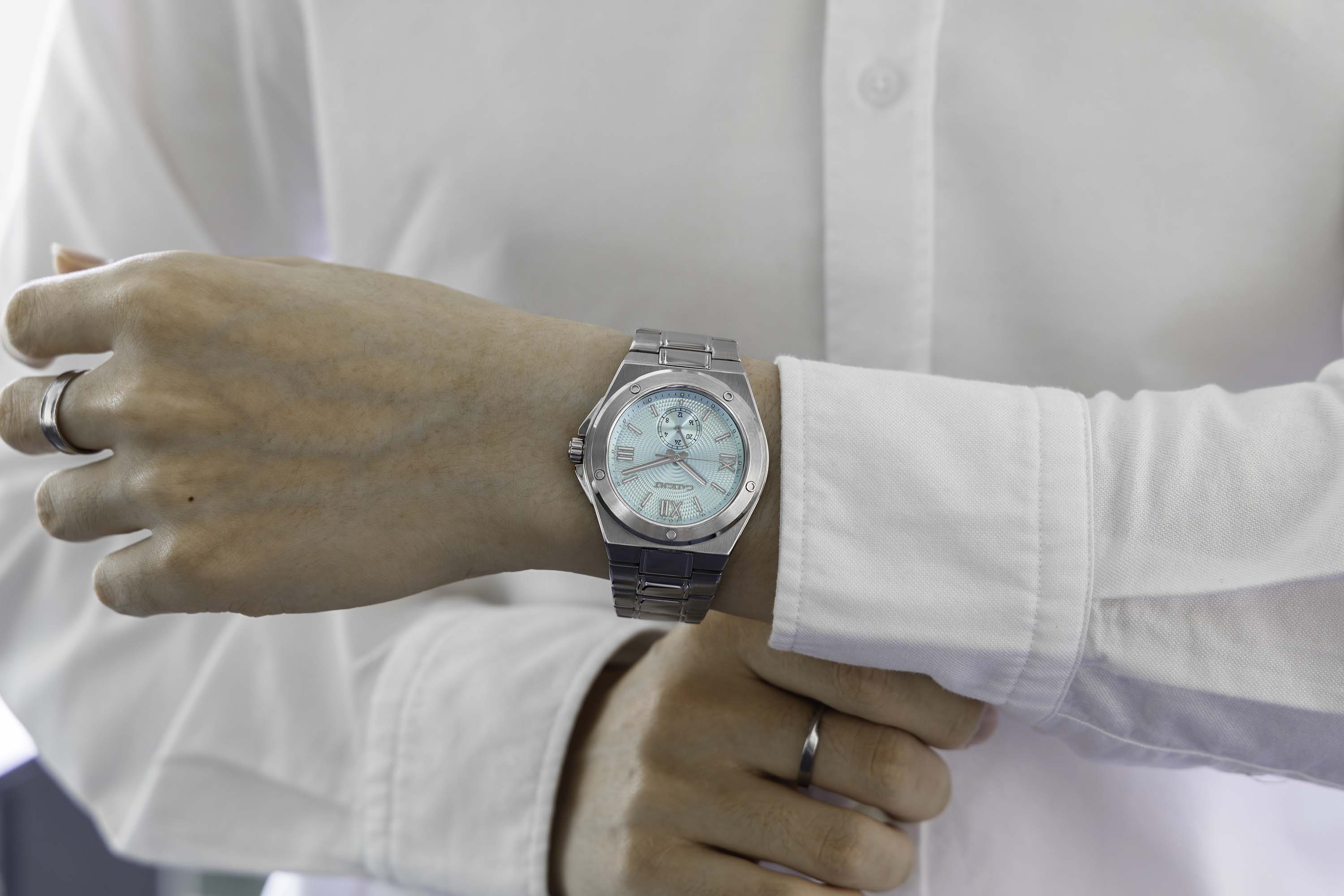 Pillarix watch wearing display, casual style, exclusive for fashionable gentlemen.