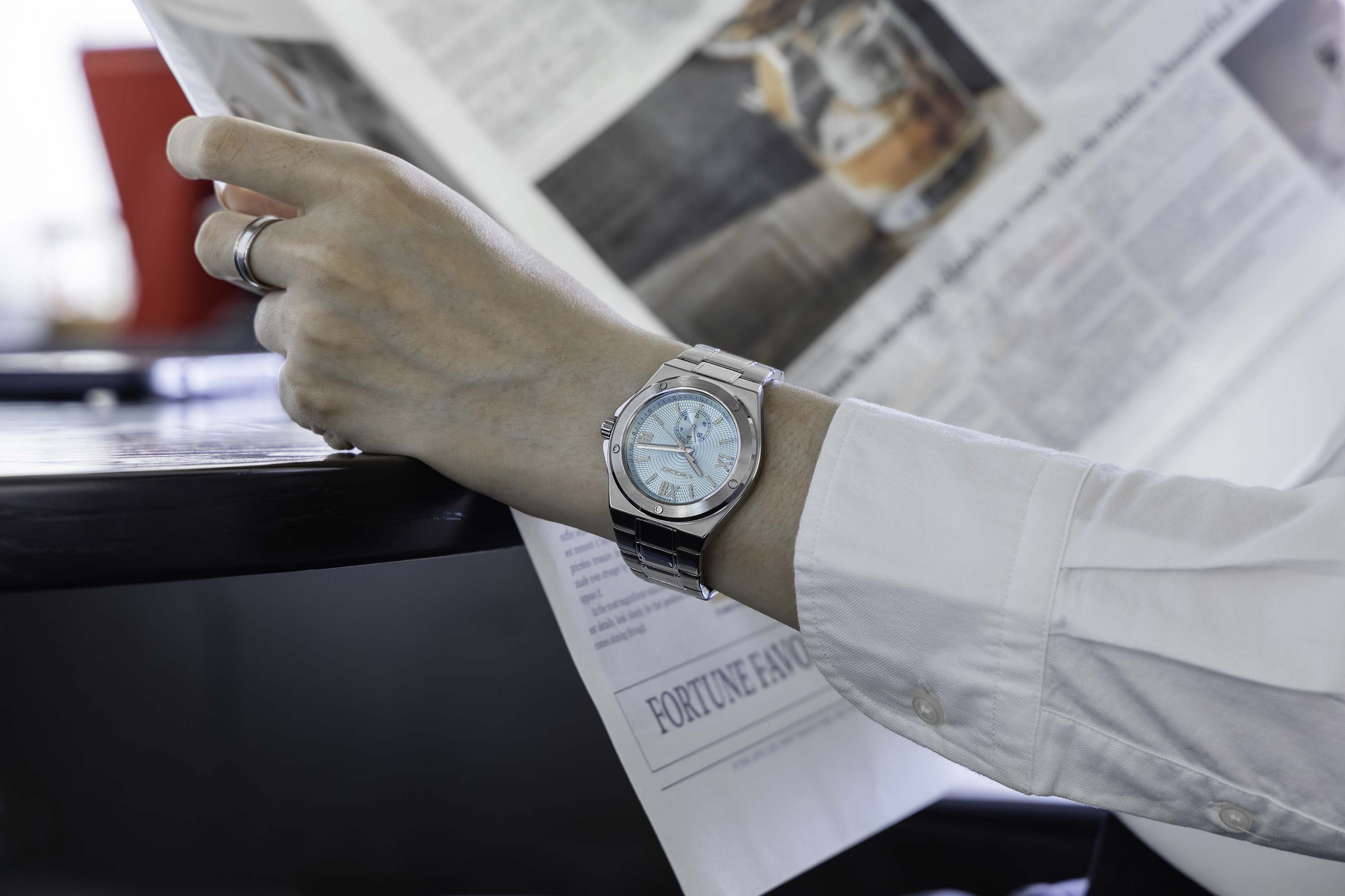 Roman numeral dial with a small inner dial, Pillarix watch. Perfect for men with an old money style.