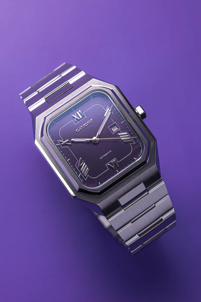 Monarch purple automatic watch with integrated 316L steel bracelet and refined geometric dial, date display