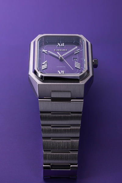 Monarch purple dial automatic watch showcasing integrated silhouette and balanced proportions