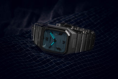 Monarch baby blue dial watch with date display and refined retro geometric design aesthetics