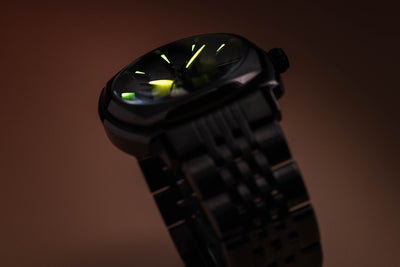 Lucent Moon Phase Watch, cool grey dial with luminous hands and markers.