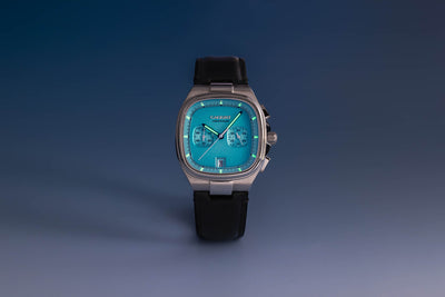 Aeris baby blue displaying luminous hands and markers for enhanced visibility in low light