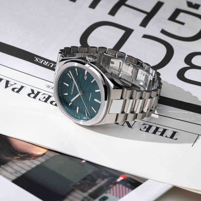 EPOCH Modern Style Watch On Newspaper Featuring Polished Stainless Steel Dial And Timeless Design