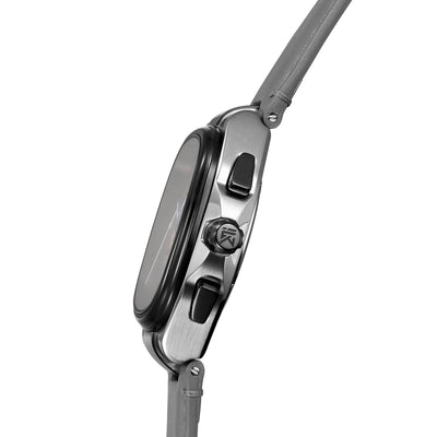 Aeris gray highlighting slim cushion case profile and signed crown