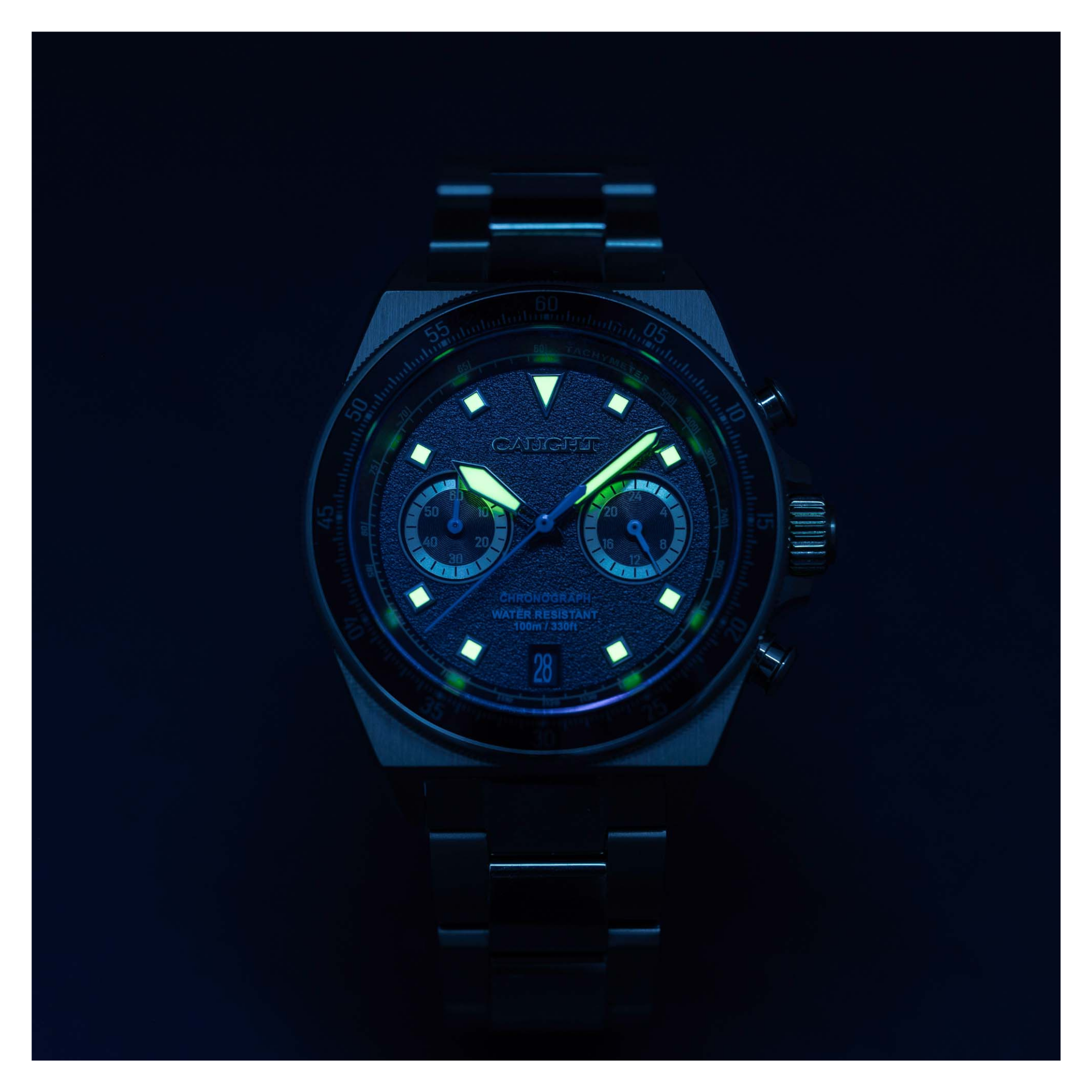 Watch dial with Luminous hands and hour markers in the dark night